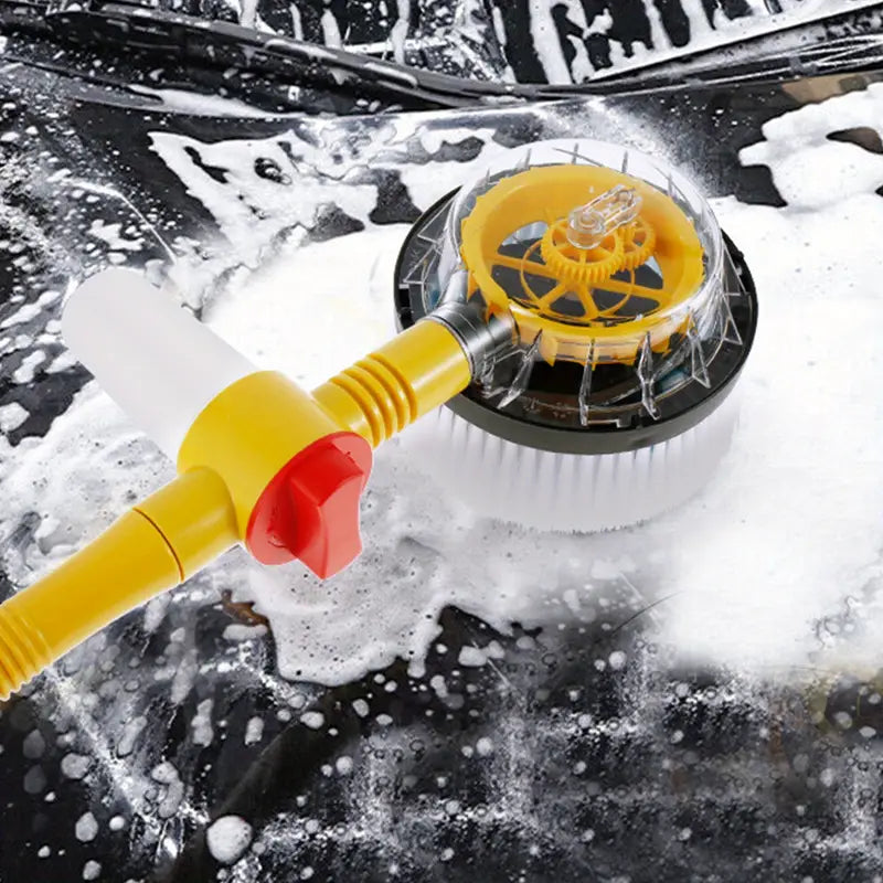 Auto-rotating car wash brush