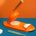 Orange shell opener with two oyster shells on a blue surface against an orange background