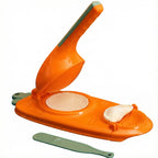 Orange tortilla press with a tortilla inside on a white background