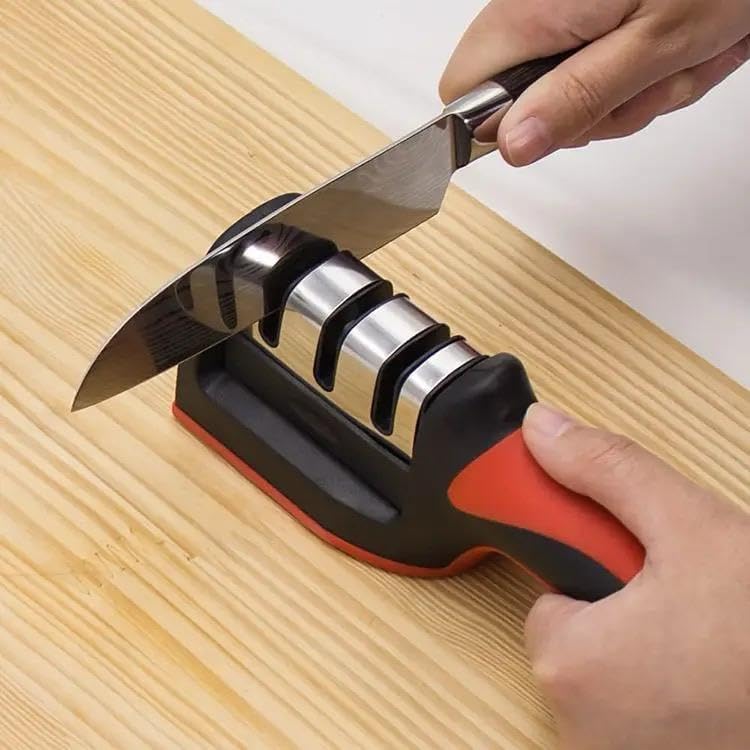 Knife sharpener being used on a wooden surface