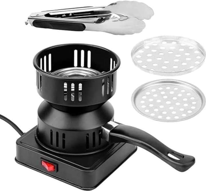 Black hot air popper with two perforated discs on a white background