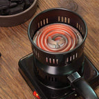 Hot dog grill with hot dogs on a wooden table