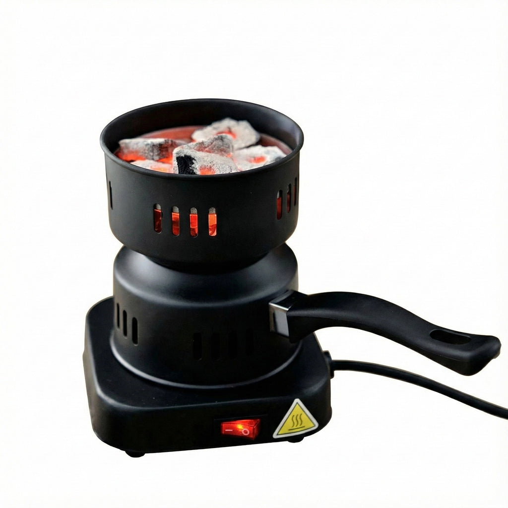 Black electric hot plate with glowing red heating elements on a white background