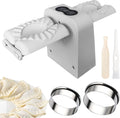 Pasta making machine with attachments and dough on a white background