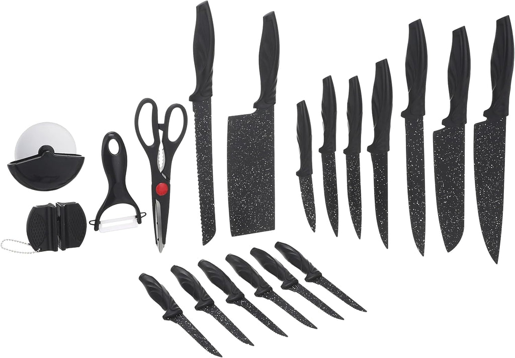 Set of black kitchen knives and tools on a white background