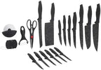 Set of black kitchen knives and tools on a white background