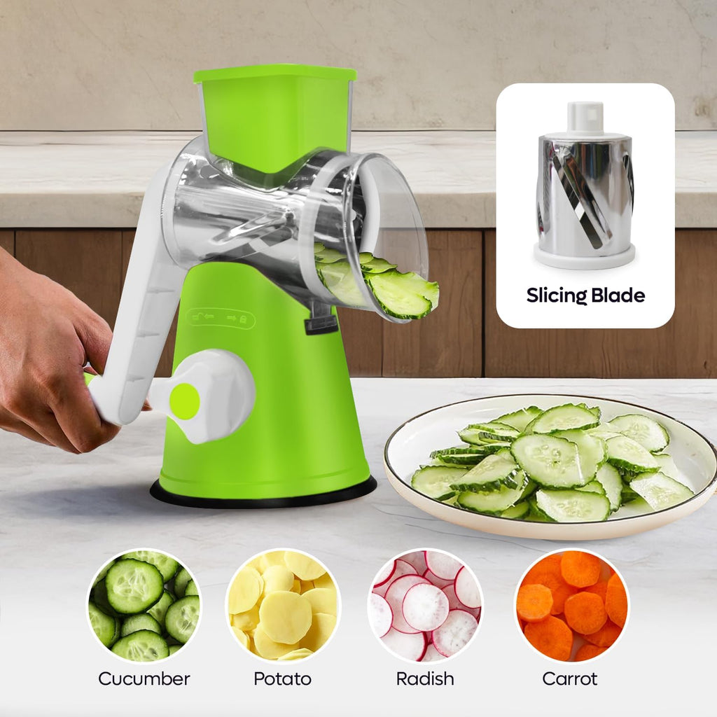 Green kitchen slicer with sliced vegetables on a countertop