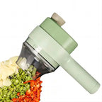 Handheld vegetable chopper with chopped vegetables on a white background