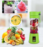 Green portable blender with fruits, smoothies, and shaved ice on a white background