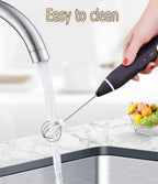 Black milk frother being rinsed under running water from a faucet with text 'Easy to clean' above.