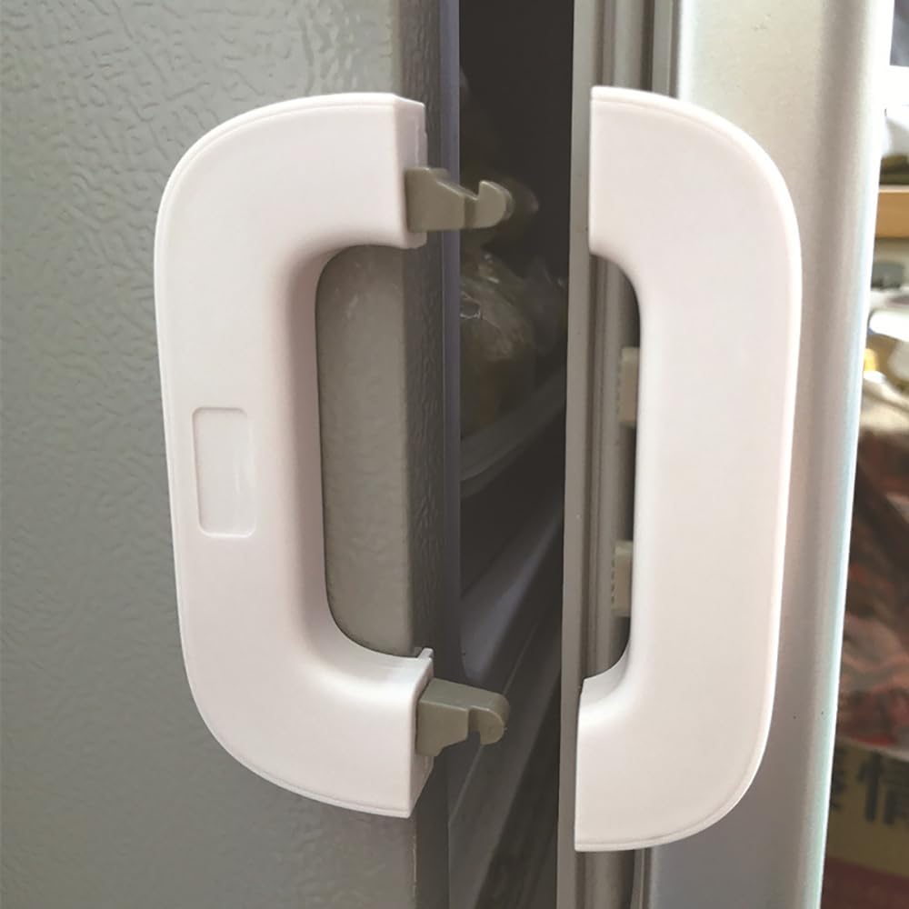 Close-up of a refrigerator handle with a white cover on a gray refrigerator.