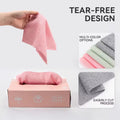 Hand holding a pink towel above a box, with text about tear-free design and color options.