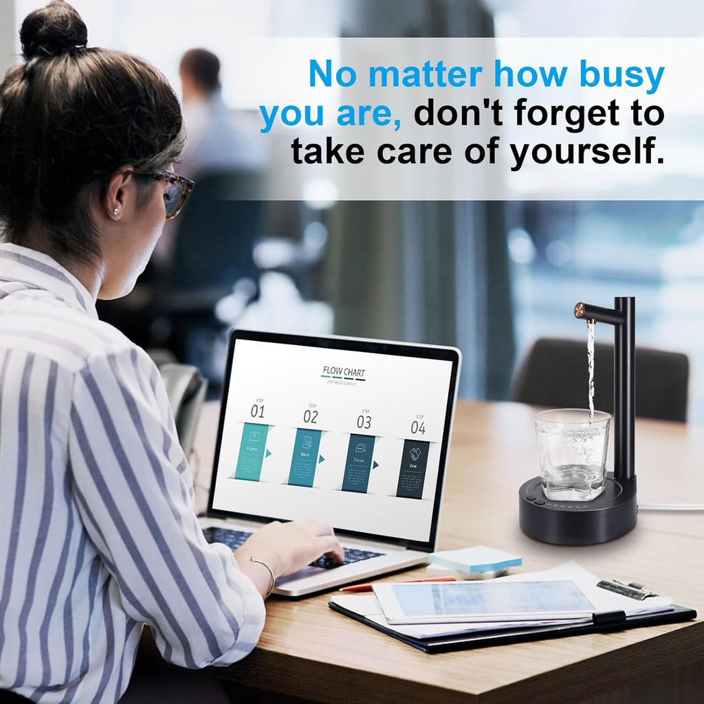 Person working on a laptop with a motivational quote above, featuring a water dispenser and glass on a desk.