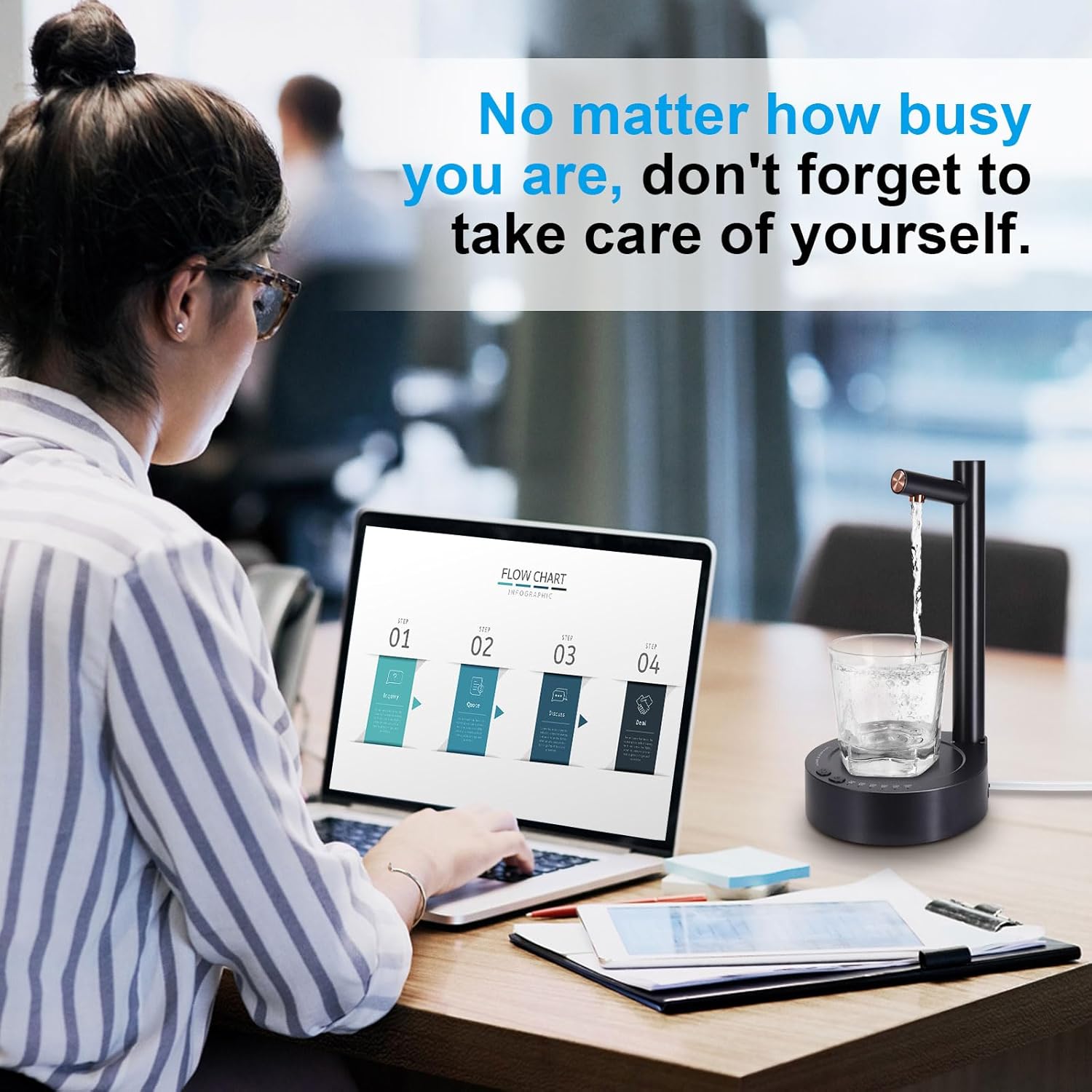 Person working on a laptop with a motivational quote above, featuring a water dispenser and glass on a desk.