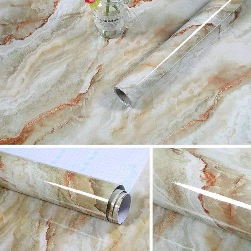 Marble-patterned vinyl wrap roll with a bottle of water on a marble surface.