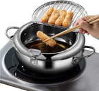 Stainless steel hot pot with oil and fried food being dipped, using chopsticks.