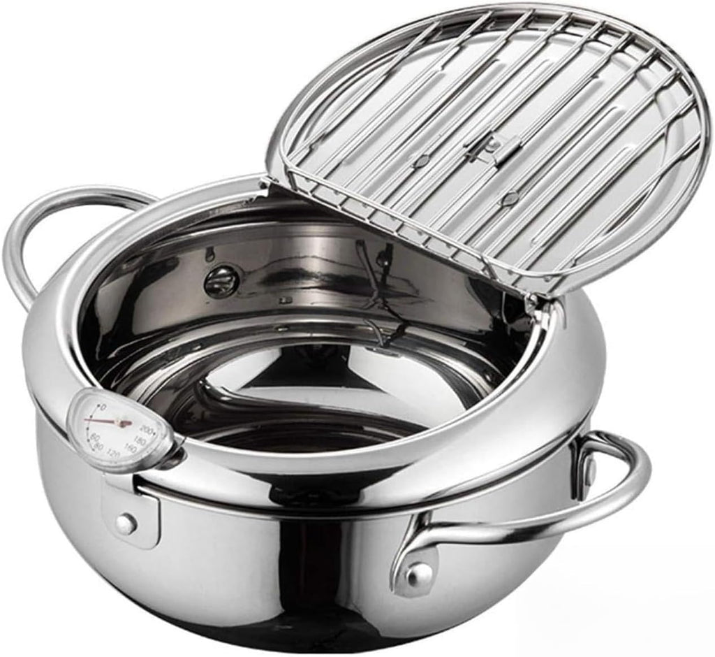 Stainless steel pot with lid on a white background